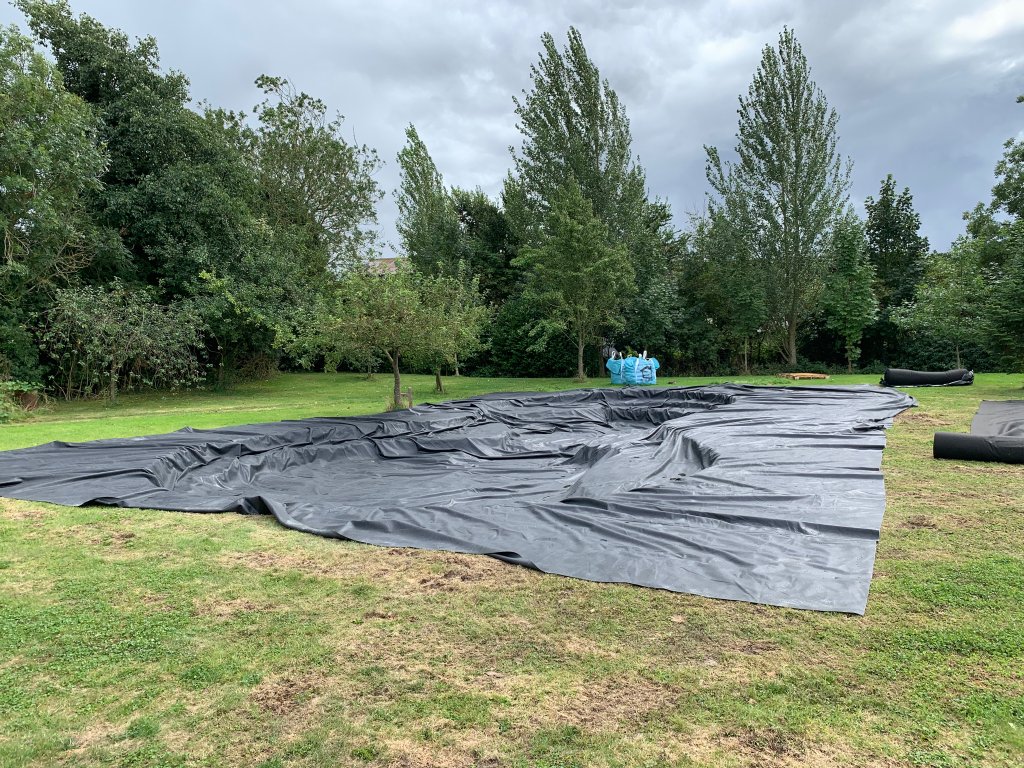 Excavation lined with butyl rubber